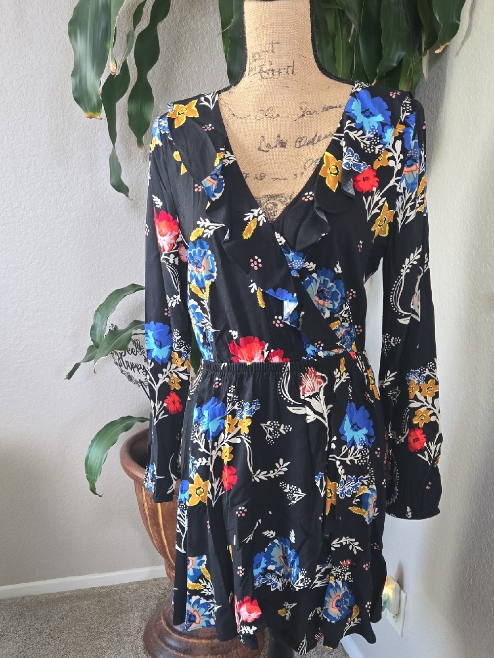 Express Black Floral Wrap Dress with Blue, Red, and Yellow Accents